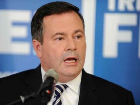 Defence Minister Jason Kenney announces a campaign promise to expand the capabilities of Canada's special operations forces at fellow Conservative candidate Trent Fraser's campaign headquarters, in Regina, on Saturday, September 26, 2015. THE CANADIAN PRESS/Mark Taylor