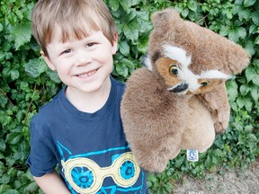 Aiden Currie, with a Great Horned Owl puppet, looks forward to this year's Owl Prowl. (Contributed photo)