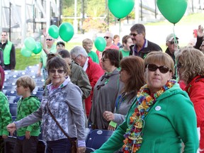 Participants warm up for the Michael O'Reilly Organ Donor Awareness Celebration walk on Saturday. Ben Leeson/The Sudbury Star/Postmedia Network