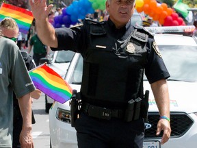Police Chief Charles Bordeleau waves to the crowd during the Capital Pride parade in August. He sat down with the Sun recently to talk about the issues facing police in the city in 2015 and some of his plans to tackle them.
Errol McGihon/Ottawa Sun