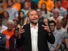 NDP Leader Tom Mulcair addresses supporters during a campaign stop in Toronto on Sunday. (THE CANADIAN PRESS)