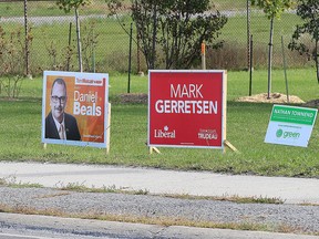 Election signs for four of the five candidates in the Kingston and The Islands Federal election at the end of Hwy. 15 at Hwy. 2  in Kingston. (Ian MacAlpine /The Whig-Standard)