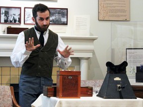 Maxime Chouinard, curator of the Museum of Health Care in Kingston, portrayed an 1890s medical doctor in honour of Culture Days 2015 on Saturday. (Steph Crosier/The Whig-Standard)