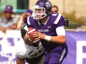 Western Mustangs quarterback Will Finch threw for four touchdowns and one interception in the Mustangs? 70-14 win over the Carleton Ravens Saturday at TD Stadium. (MIKE HENSEN, The London Free Press)