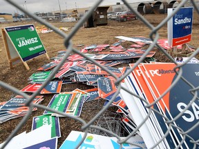 Provincial election signs removed by the City sit in a sign impound lot near 5710 - 86 Street in Edmonton, Tuesday April 17, 2012.