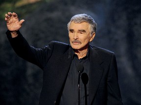 Actor Burt Reynolds accepts award onstage during Spike TV's Guys Choice 2013 at Sony Pictures Studios on June 8, 2013 in Culver City, California.  Kevin Winter/Getty Images for Spike TV/AFP