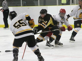 A Vermilion Tigers player gets hooked by an Onion Lake Border Chiefs player during an exhibition game last Thursday at the Vermilion Arena. The Tigers hung on for a 4-3 win in one of its four exhibition games. The team played the Bandits in Lloydminster on Saturday and the week prior travelled to Fort St. John for a pair of games.