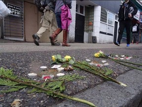Three bronze plaques bearing the names of Robert Pickton's victims were recently removed from a Vancouver sidewalk. They are pictured here on February 14, 2015. THE CANADIAN PRESS/HO/Sean Faludi