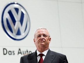 Volkswagen Chief Executive Martin Winterkorn stands at the Volkswagen booth at the world's largest industrial technology fair, the Hannover Messe, in Hanover, in this file picture taken April 13, 2015. Winterkorn resigned on September 23, 2015, taking responsibility for the German carmaker's rigging of U.S. emissions tests.  REUTERS/Wolfgang Rattay/Files
