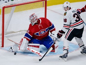 Montreal Canadiens goalie Carey Price makes a save on Chicago Blackhawks forward Daniel Paille at the Bell Centre. (Eric Bolte/USA TODAY Sports)