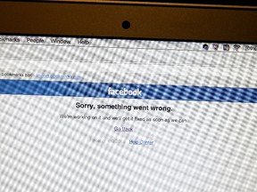 An error message appears on the Facebook home page on a laptop computer screen on September 28, 2015. (Photo illustration by Justin Sullivan/Getty Images/AFP