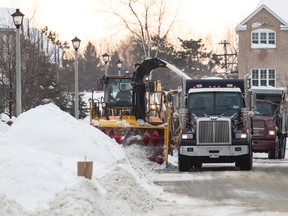 Heavy equipment shown here being used on Scout Street in 2013 clean up a heavy snowfall in the city.
Errol McGihon/Ottawa Sun files