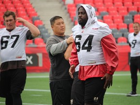 Offensive lineman J'Micheal Deane (64). TIM BAINES/OTTAWA SUN