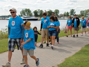 Walkers set off on their five kilometer journey along the St. Clair River on Sept. 20 as part of the Parkinson's Society of Southwestern Ontario's annual SuperWalk. The event raised over $35,000 for Parkinson's research and support programs.
CARL HNATYSHYN/SARNIA THIS WEEK