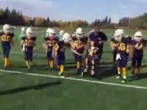 Logan Tonge, 11, got the chance to score a touchdown in a Regina Minor Football game. (kristamclean22/YouTube screengrab)