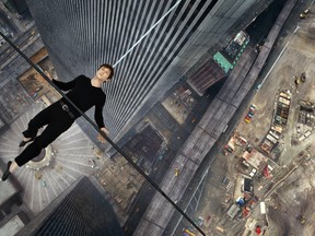 In this image released by Sony Pictures, Joseph Gordon-Levitt portrays Philippe Petite in a scene from, "The Walk." The film is about high-wire artist Phillippe Petit’s cabled walk between the Twin Towers in 1974.  (Sony Pictures photo)