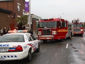 Toronto firefighters put out an apartment fire at 1169 Danforth Ave., just west of Greenwood Ave., Tuesday morning. (CHRIS DOUCETTE/Toronto Sun)