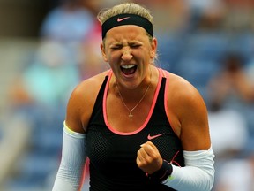 Victoria Azarenka of Belarus reacts against Simona Halep of Romania during their Women's Singles Quarterfinals match on Day Ten of the 2015 U.S. Open at the USTA Billie Jean King National Tennis Center on September 9, 2015 in the Flushing neighborhood of the Queens borough of New York City.   Mike Stobe/Getty Images for the USTA/AFP