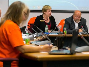 Tim Miller/The Intelligencer 
Members of the Hastings Prince Edward District School Board discuss Wednesday's Orange Shirt Day initiative in recognition of those who went through the ordeal of Indian Residential Schools on Monday in Belleville. Each member of the board was given an orange shirt during the meeting.