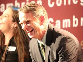 Cambrian College president Bill Best, shares a laugh during the unveiling of Cambrian College's strategic plan in Sudbury, Ont. on Tuesday September 29, 2015. Gino Donato/Sudbury Star/Postmedia Network