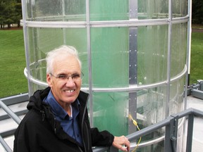 Green smoke swirls in Louis Michaud's Atmospheric Vortex Engine at Lambton College, in this file photo. Michaud's vortex-generating prototype is one of two projects at Lambton College being featured at Saturday's Ontario-wide Green Energy Doors Open event. It runs from 10 a.m. to 2 p.m. (File photo/Sarnia Observer)