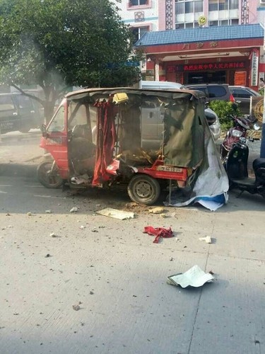 A vehicle is seen damaged after explosions hit Liucheng county, Guangxi Zhuang Autonomous Region, China, Sept.  30, 2015. REUTERS/Stringer
