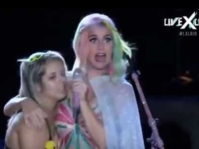 A Katy Perry fan gets way too close to the superstar. (YouTube screen grab)