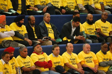 Taxi industry people watch the debate over Uber in the Toronto city council chambers Wednesday September 30, 2015. (Michael Peake/Toronto Sun)