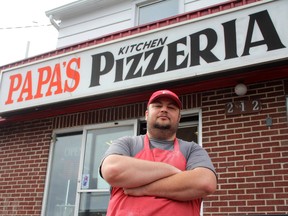 SARAH HYATT/THE INTELLIGENCER
Darryl Joudrey, outside Papa’s Kitchen Pizzeria, in Belleville, is upset with the work-to-rule action at local schools. The local pizzeria supplies pizza to many local schools for their pizza days.