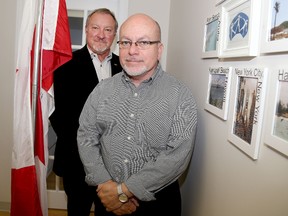 Emily Mountney-Lessard/The Intelligencer
Quinte United Immigration Services executive director Orlando Ferro (front) and board of directors president Paul Osborne are shown here at the QUIS offices, on Wednesday, in Belleville.