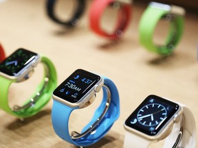 Apple Watches are displayed following an Apple event in San Francisco, California in this March 9, 2015 file photo.  REUTERS/Robert Galbraith/Files