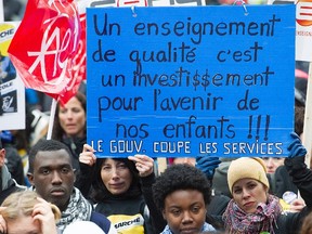 French-language public school teachers demonstrate in Montreal, Wednesday, September 30, 2015, where they protested against government austerity cuts. THE CANADIAN PRESS/Graham Hughes