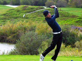 Niagara's Evan Littlefield tees off on the final hole of the Ontario Colleges Athletic Association men's golf championship at Hunters Pointe in Welland on Wednesday. Littlefield won the individual title and Niagara won the team championship. (Bernd Franke/Postmedia Network)