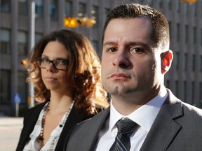 Const. James Forcillo leave court with his wife, Irina, on Wednesday. (CRAIG ROBERTSON, Toronto Sun)