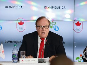 Canadian Olympic Committee president Marcel Aubut speaks at Canada House on the final day of the Pan Am Games Sunday July 26, 2015. (Jack Boland/Toronto Sun/Postmedia Network)