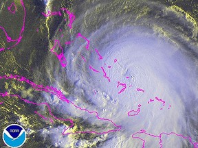 Hurricane Joaquin is seen over the Bahamas in the western Atlantic Ocean in this NOAA GOES East satellite image taken at 07:45 ET (11:45 GMT) Oct. 1, 2015.  REUTERS/NOAA/Handout
