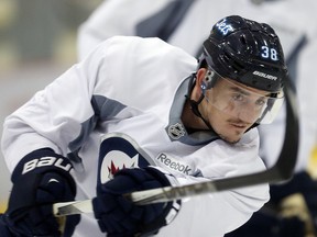 Nic Petan will play on a line Thursday night with Andrew Ladd and Bryan Little. (Brian Donogh/Winnipeg Sun file photo)