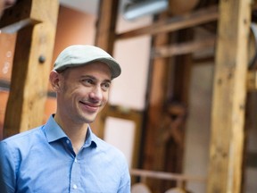 Shopify CEO Tobias Lutke checks out the new Shopify office space in Waterloo, Ont. on Thursday, Oct. 1, 2015. The new office is a former Seagram's Distillery building in Waterloo. THE CANADIAN PRESS/Hannah Yoon