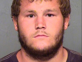 Leslie Merritt Jr. is pictured in this undated handout booking photo provided by the Maricopa County Sheriff's Office. Merritt, 21, pleaded not guilty on Thursday to 15 felonies including drive-by shooting and aggravated assault, a court spokesman said.  REUTERS/Maricopa County Sheriff's Office/Handout via Reuters