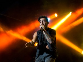 Jacob Hoggard performing with Hedley on the Bell Stage at Bluesfest in Ottawa, Ont. on Wednesday July 15, 2015. Errol McGihon/Postmedia Network