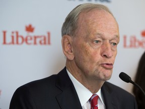 Former prime minister Jean Chretien pauses while speaking during a news conference with local Liberal Party candidates in Vancouver, B.C., on Thursday October 1, 2015. THE CANADIAN PRESS/Darryl Dyck