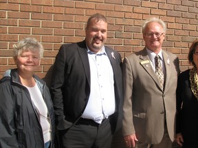 The Chatham-Kent branch of CARP held a flag-raising ceremony at the Civic Centre on Thursday to celebrate National Seniors Day. On hand for the ceremony were Sharon-Allen Jubenville, chair of the CK branch; Ian Murray and Steve Brent, CARP board members; and Karen Herman, South Kent Coun. (Blair Andrews, Postmedia Network)