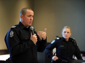 Sgt. Ryan Ferry (l) and Sgt. Michelle Horochuk talks about Managing Bias at EPS Victim Services Conference for Families of Missing or Murdered Persons at Delta South Hotel on October 1, 2015 in Edmonton, Alta.  Perry Mah/Edmonton Sun