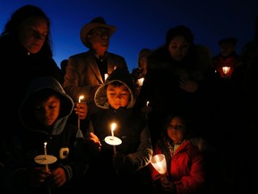 A candlelight vigil was held for the Neville-Lake family  at the St. Padre Pio Church in Vaughan on Oct. 1, 2015. (Stan Behal/Toronto Sun)