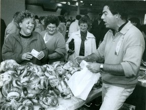 Larry Silverstein entertains customers at the Hadassah bazaar in 1989. (File photo)