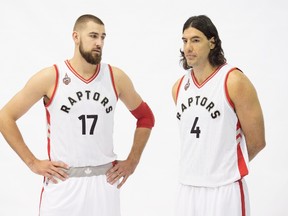 Toronto Raptors Jonas Valanciunas, left, and Luis Scola pose during the team’s media day in Toronto on Monday, September 28, 2015. (THE CANADIAN PRESS/Darren Calabrese)