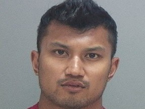 This undated photo provided by Salt Lake County Jail shows Alexander Hung Tran. Police in Utah arrested Tran on Saturday, Sept. 19, 2015, for the fatal shooting of multiple people. (Salt Lake County Jail via AP)