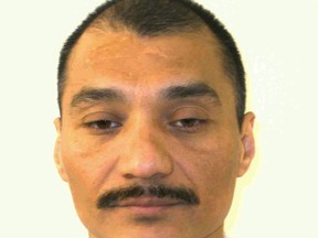 This undated file photo, provided by the Virginia Department of Corrections shows inmate Alfredo Prieto. A twice-condemned serial killer who claimed he was intellectually disabled was executed in Virginia on Thursday, Oct. 1, 2015, after a series of last-minute appeals failed. (Virginia Department of Corrections via AP, File)