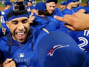 David Price of the Toronto Blue Jays celebrates with teammates after clinching the AL East Division title at Camden Yards on September 30, 2015 in Baltimore. (Patrick Smith/Getty Images/AFP)