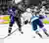 The Edmonton Oilers' Connor McDavid (97) battles the Vancouver Canucks' Dan Hamhuis (2) during third period NHL action at Rexall Place, in Edmonton Alta. on Thursday Oct. 1, 2015. The Canucks won 5-2. David Bloom/Edmonton Sun/Postmedia Network